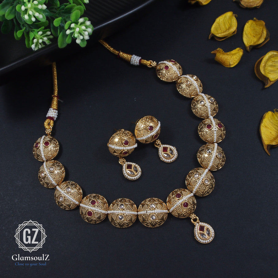 Elevate your style with our exquisite Rajwadi Necklace from Glamsoulz. Handcrafted with intricate details, perfect for adding a touch of luxury to any outfit.
