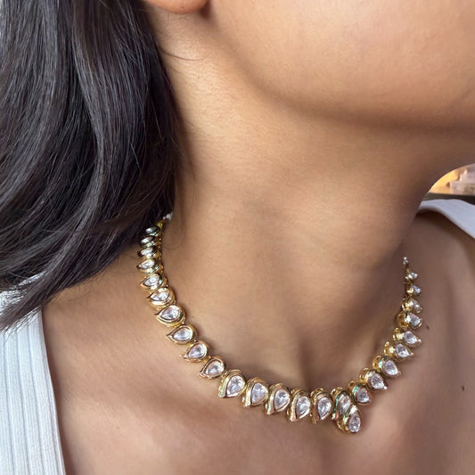 AD Kundan teardrop necklace with white stones and gold finish