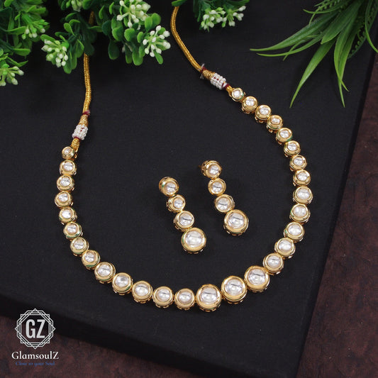 Elevate your style with Glamsoulz's exquisite Kundan single line necklace. Handcrafted luxury meets modern elegance in this must-have accessory. Shop now for timeless glamour!