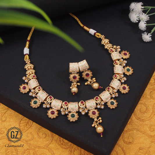 Elevate your style with Glamsoulz's Rajwadi short necklace. Handcrafted with exquisite detailing, perfect for modern fashionistas. Shop now for a touch of elegance!