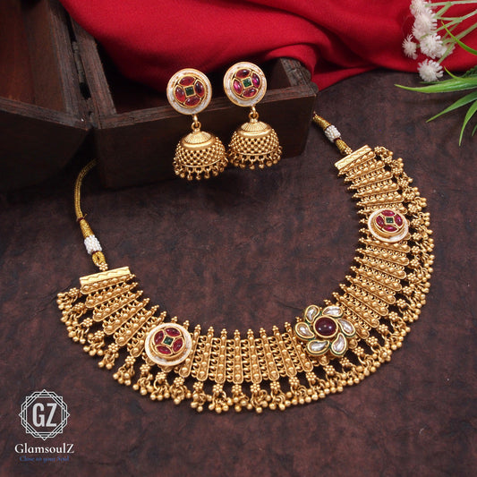 Elevate your style with the exquisite Rajwadi short necklace from Glamsoulz. Crafted with intricate detail, this piece is perfect for a touch of luxury.